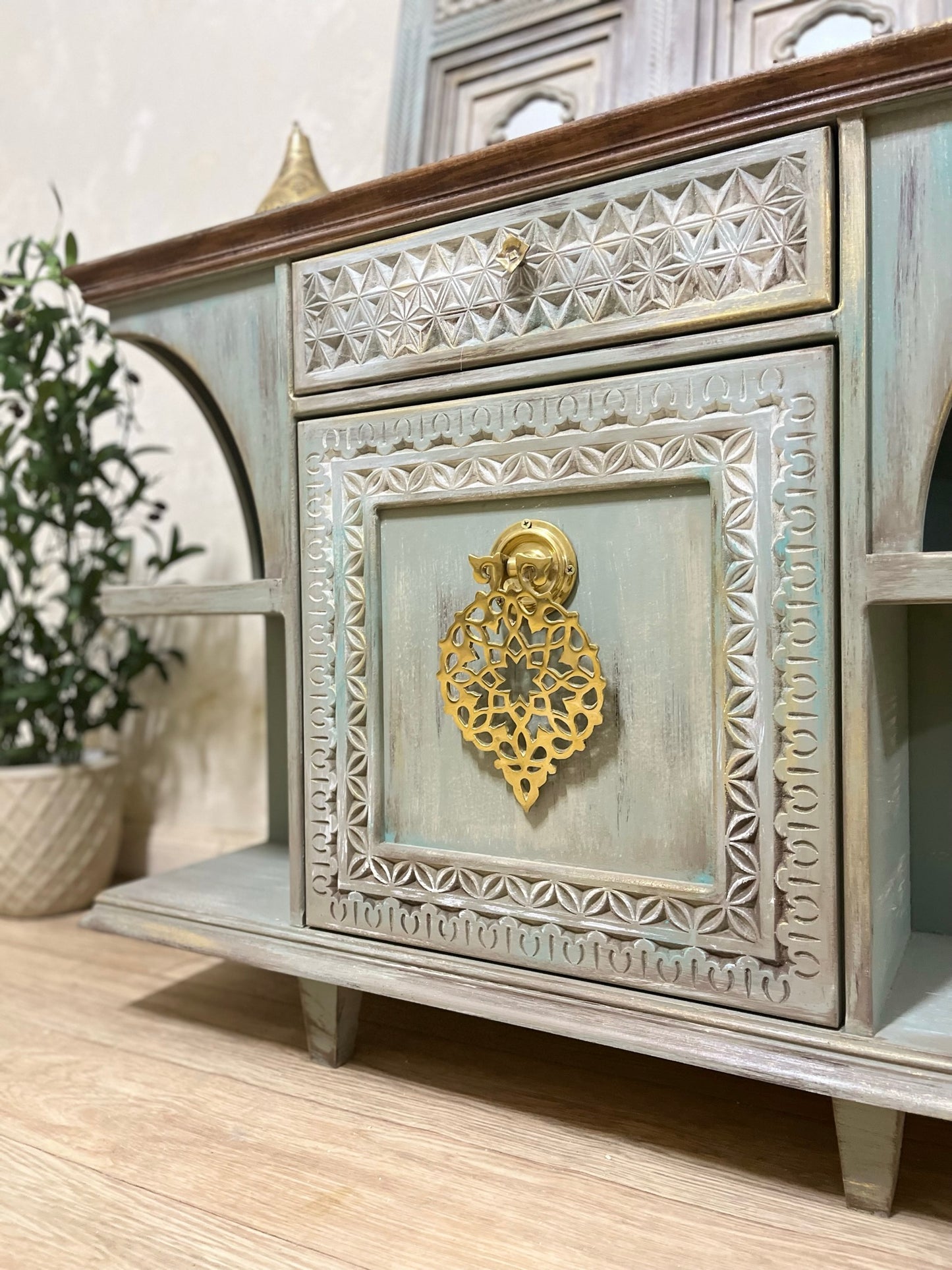 Elegant Console with Brass Accent and Oriental Charm